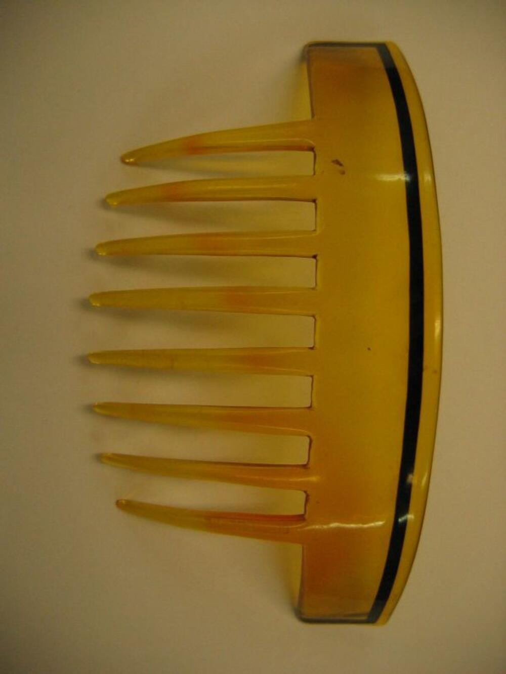 Haarkam in geel plastic