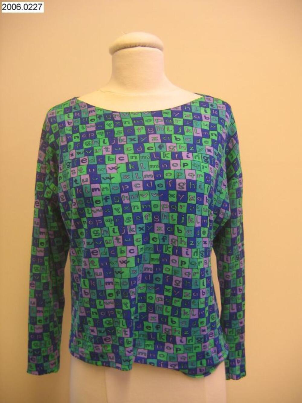 T-shirt met lange mouwen in felgroen, felblauw en mauve bedrukt met letters