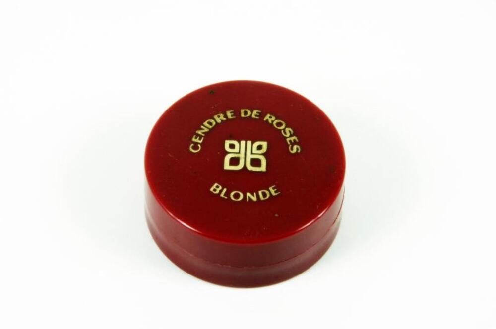 Bordeaux plastic doosje met wangenrood en dun doekje