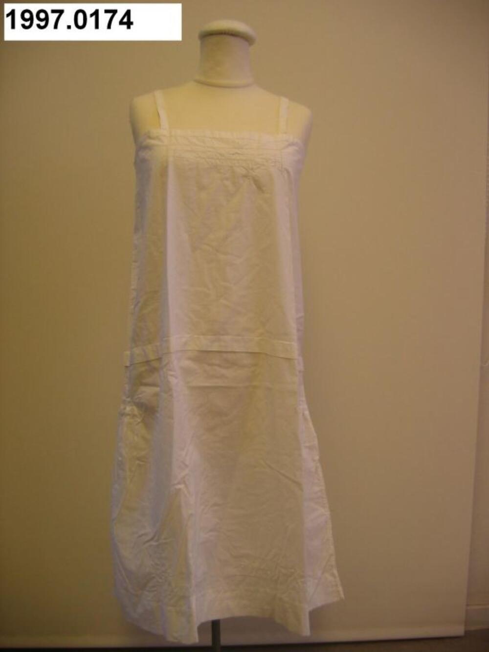 Onderjurk in witte katoen met broderierand
