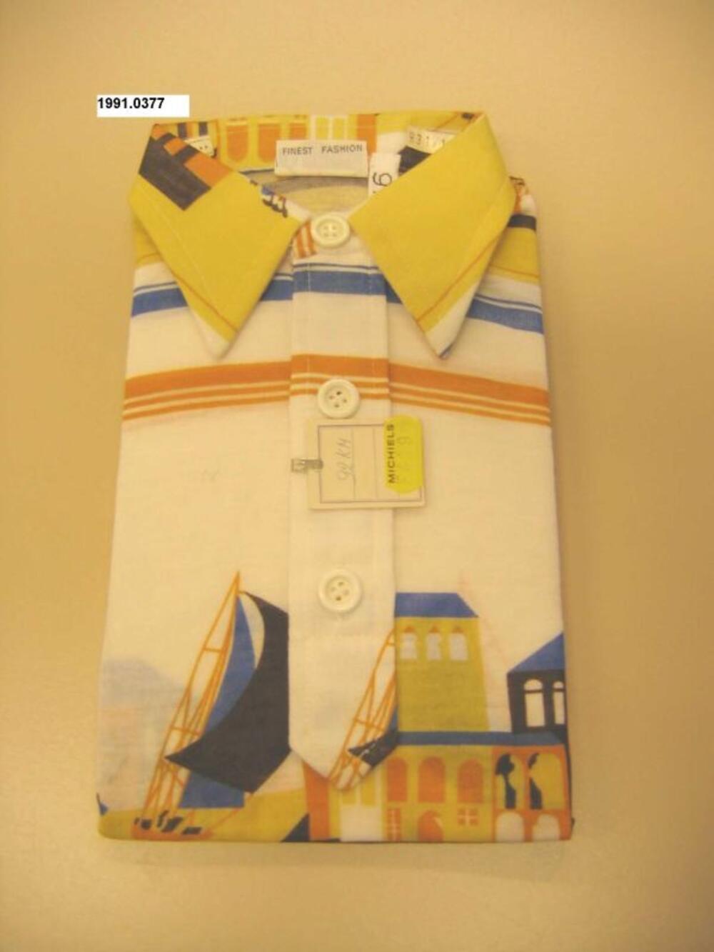 Poloshirt in wit tricot met figuratieve bedrukking
