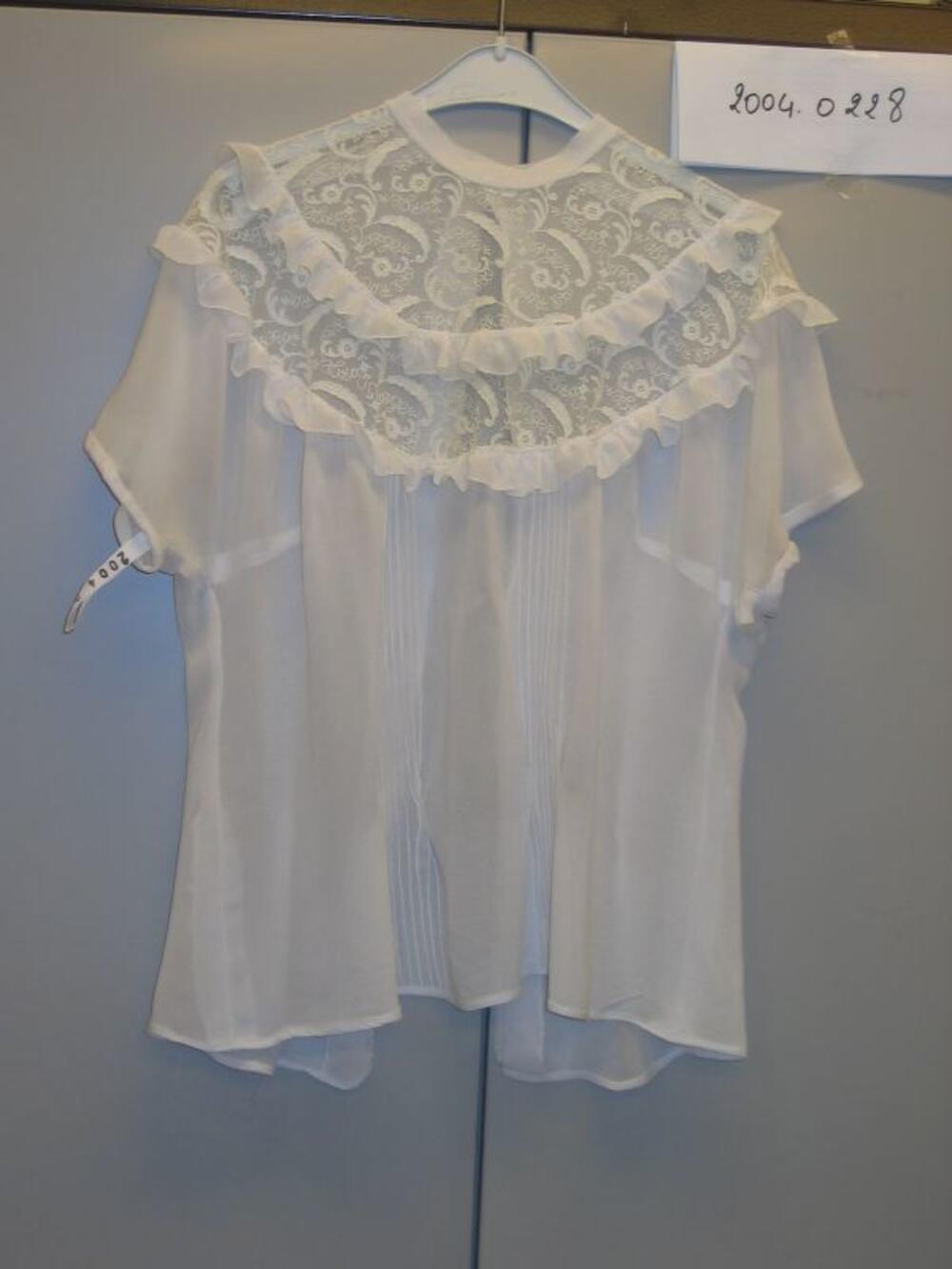 Blouse in witte crêpe