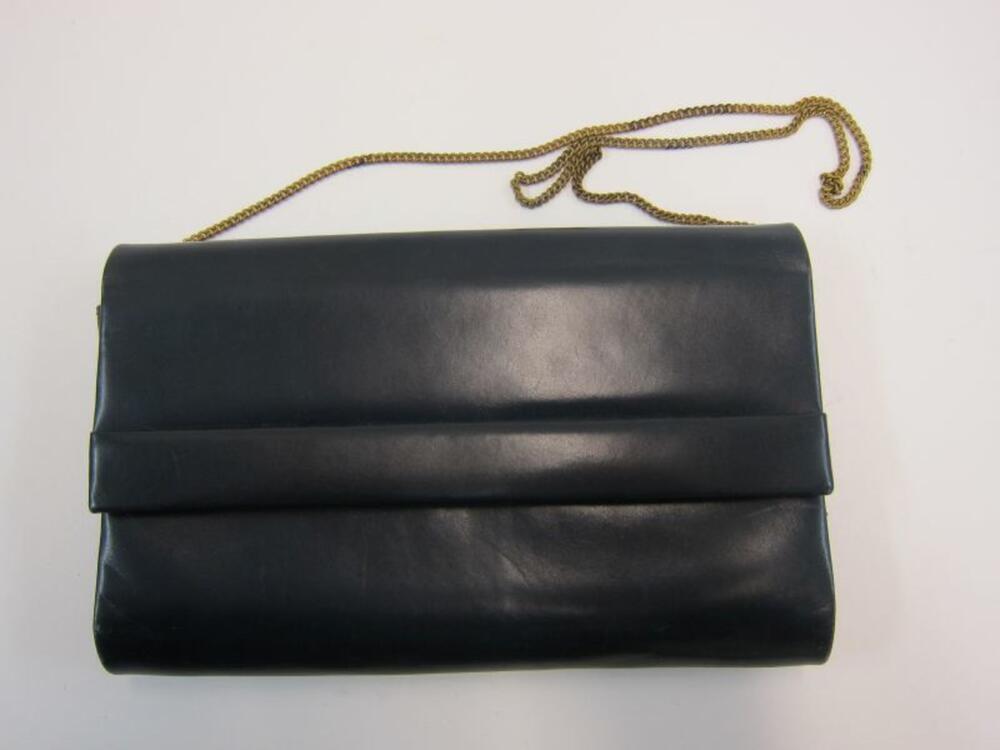 Enveloppetas in pretroleumblauw leer