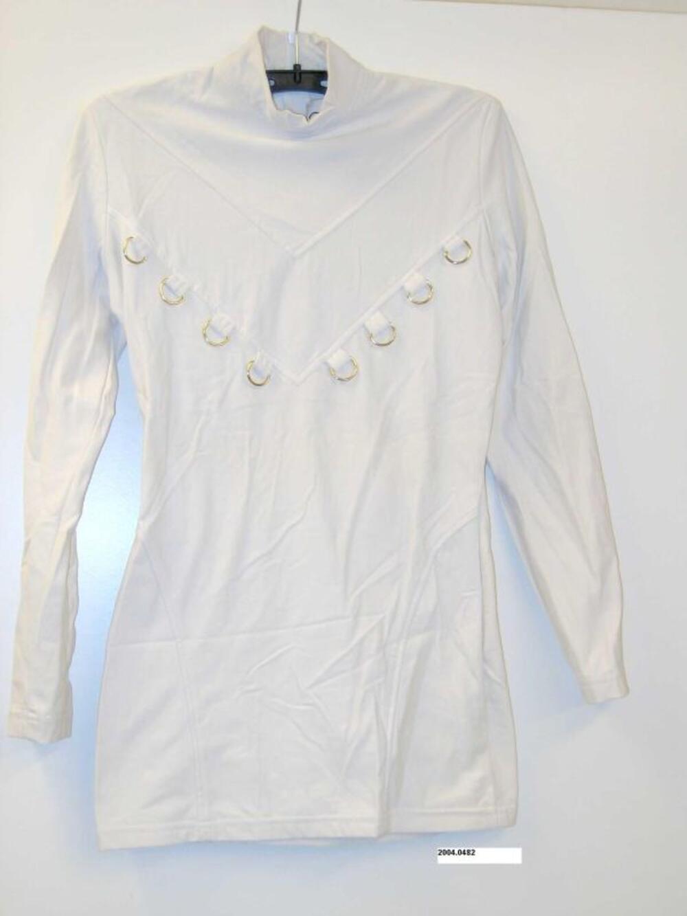 Coltrui in witte lycra met metalen ringen