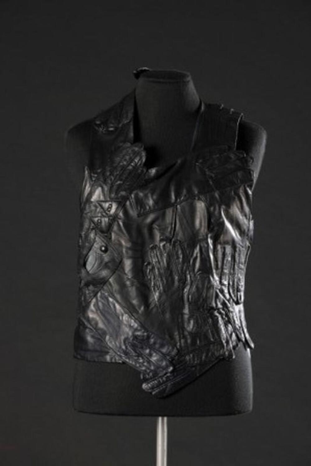 Gilet van zwarte, leren vintagehandschoenen