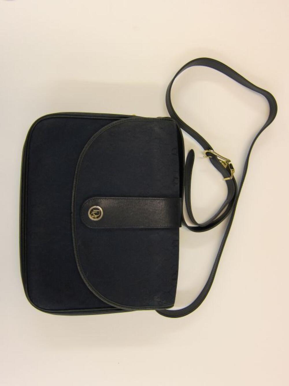 Handtas in donkerblauw leer en donkerblauwe stof