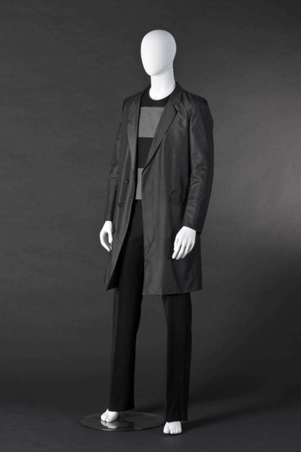 Ensemble bestaande uit mantel, gilet en broek