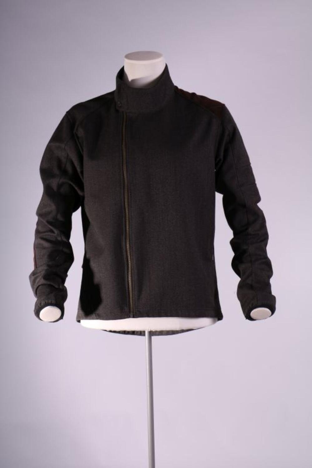 Jas in grijze tweed softshell met rits aan de rechterkant