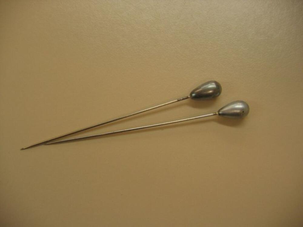 Hoedenspelden met druppelvormige kop