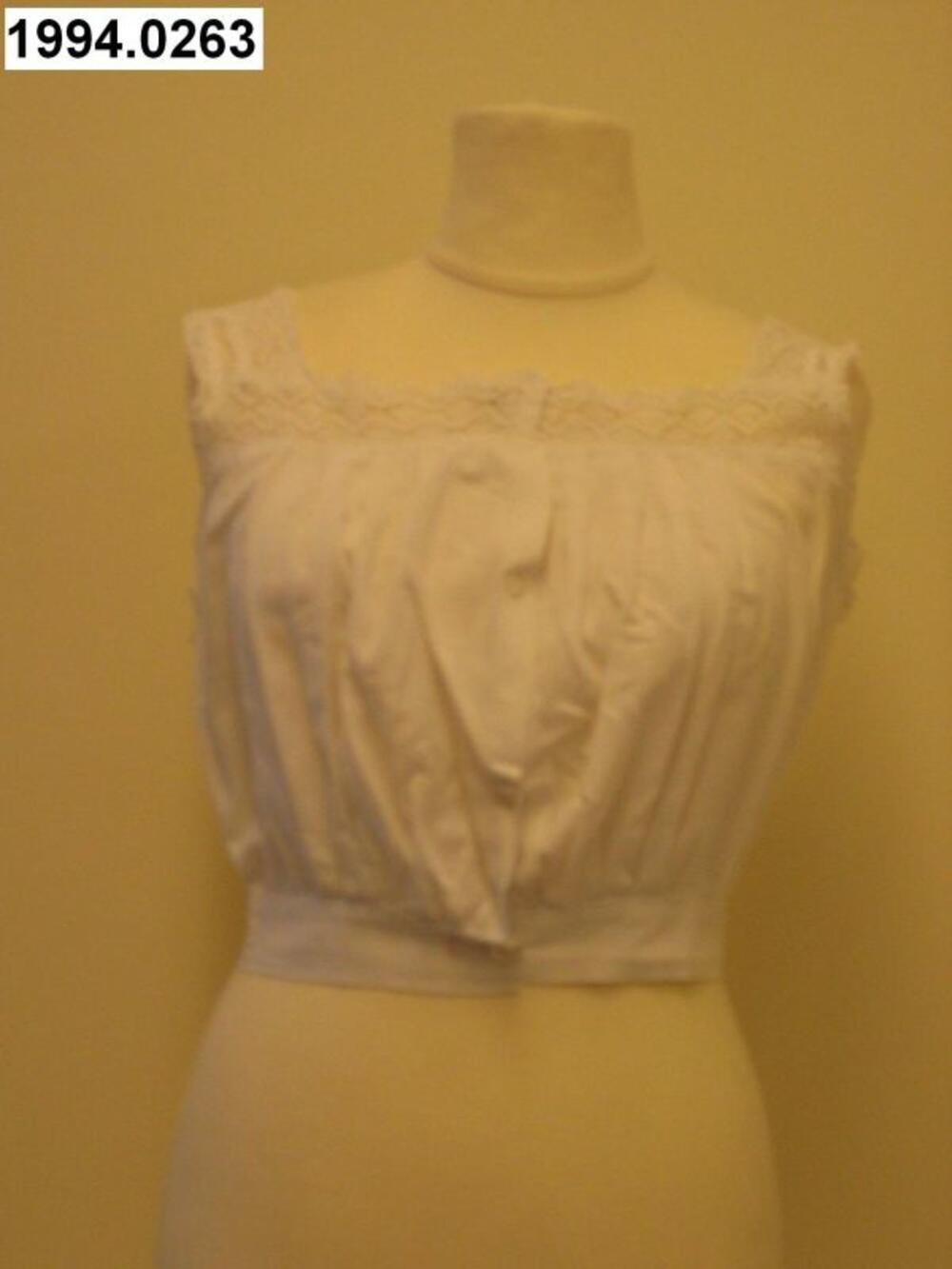 Cache-corset in wit katoen afgewerkt met broderie anglaise