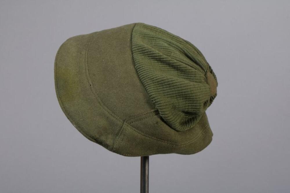 Muts in groene vilt en