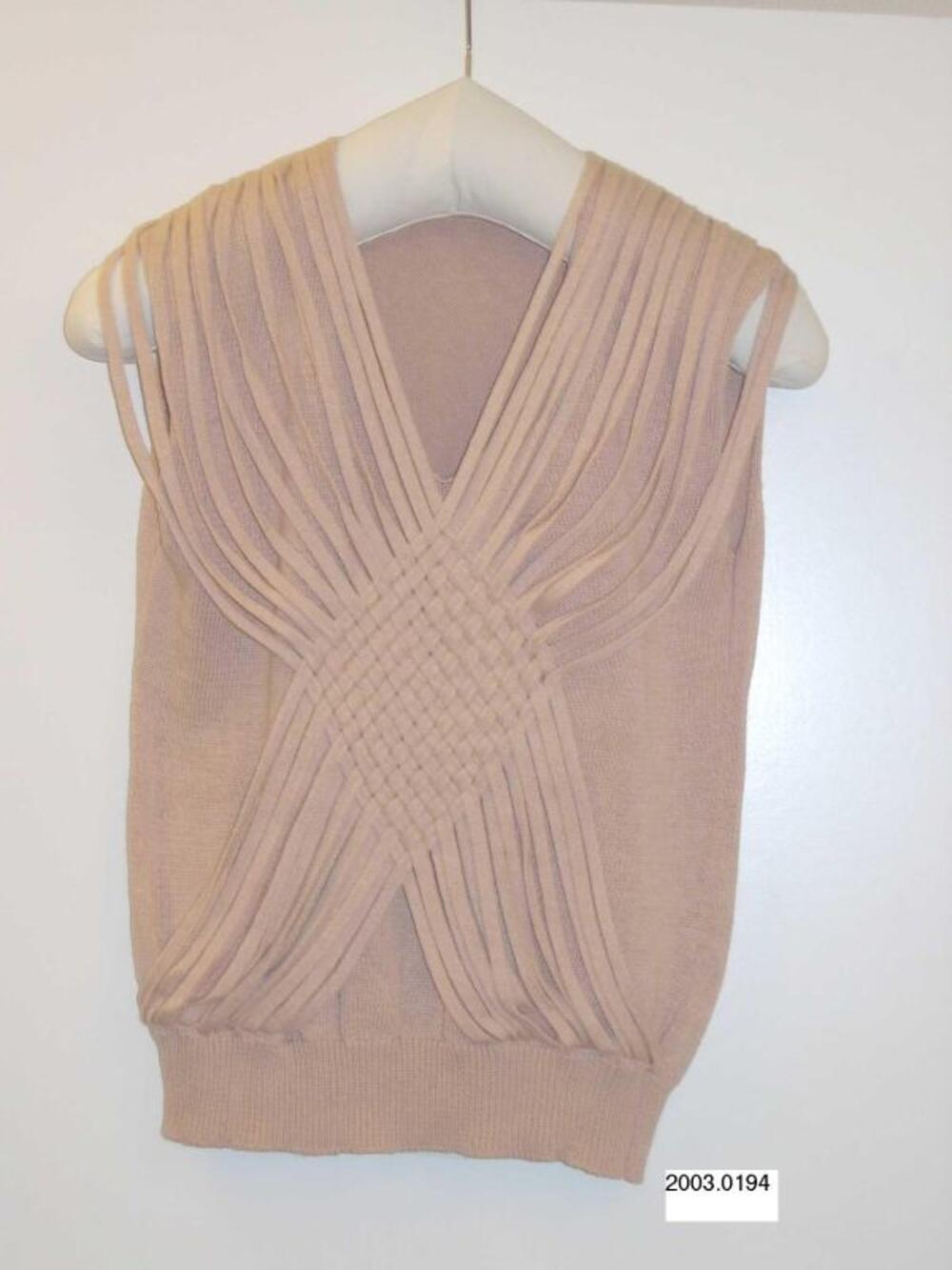 Blouse in huidskleurige tricot
