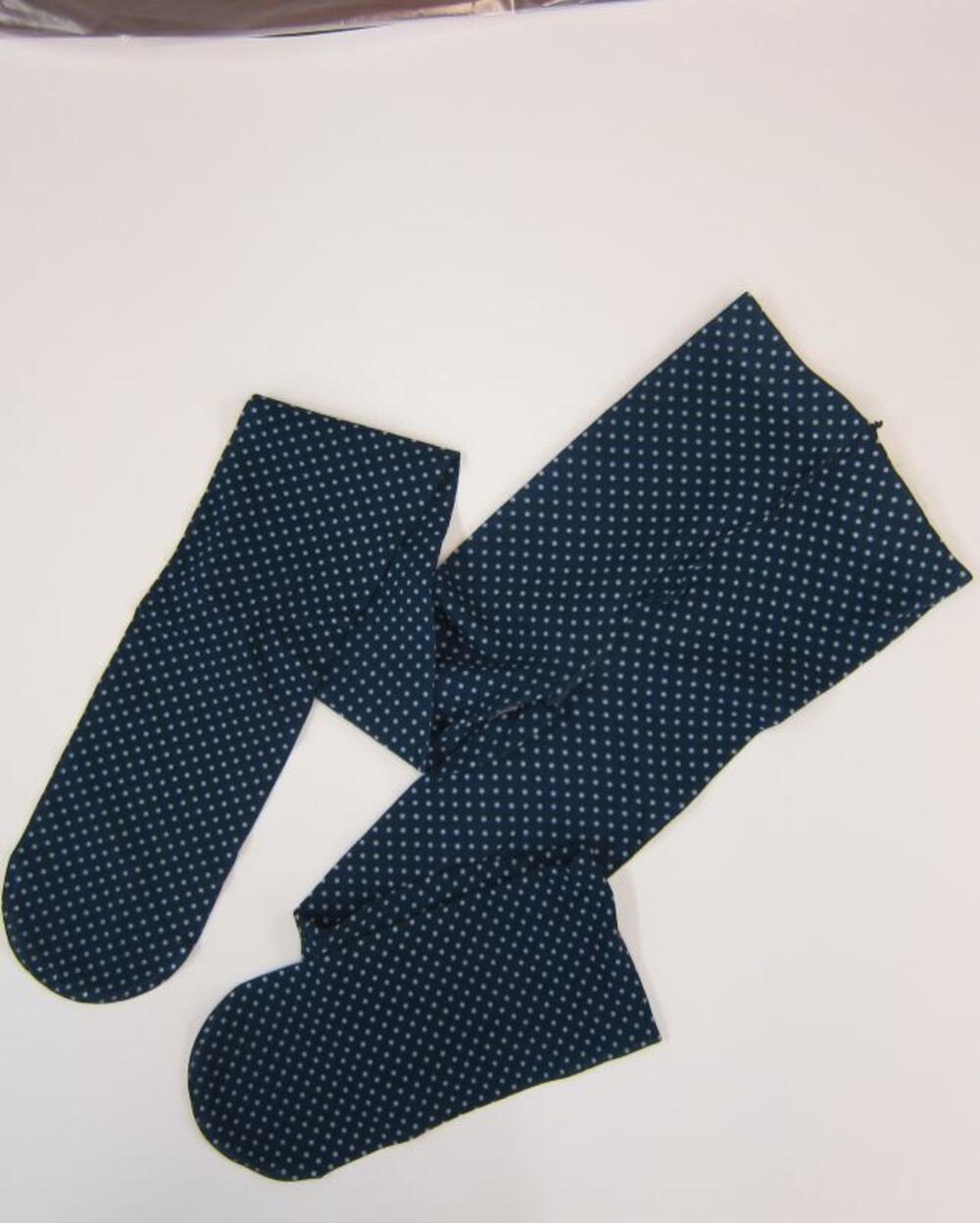 Panty in donkerblauwe nylon met witte stippen
