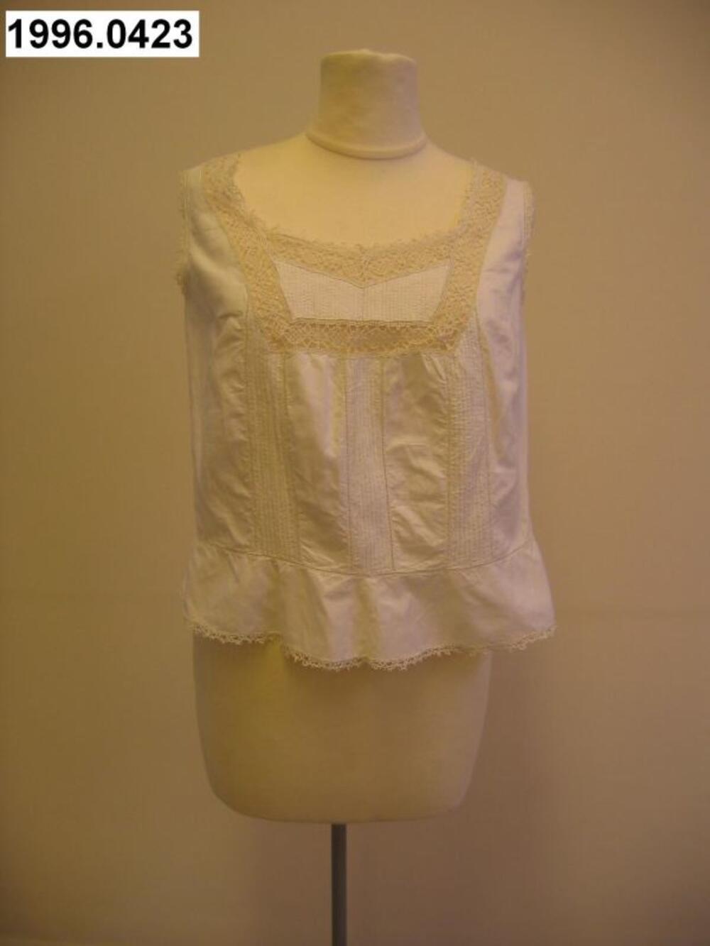 Cache-corset in wit batist met korte basque