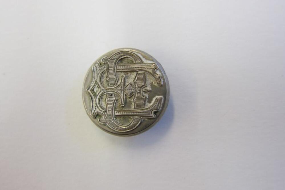 Manchetknoop in metalen munt