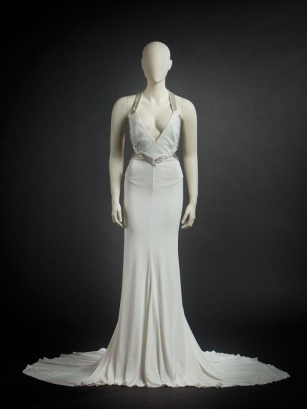 Lange witte jurk met met pailettenversiering
