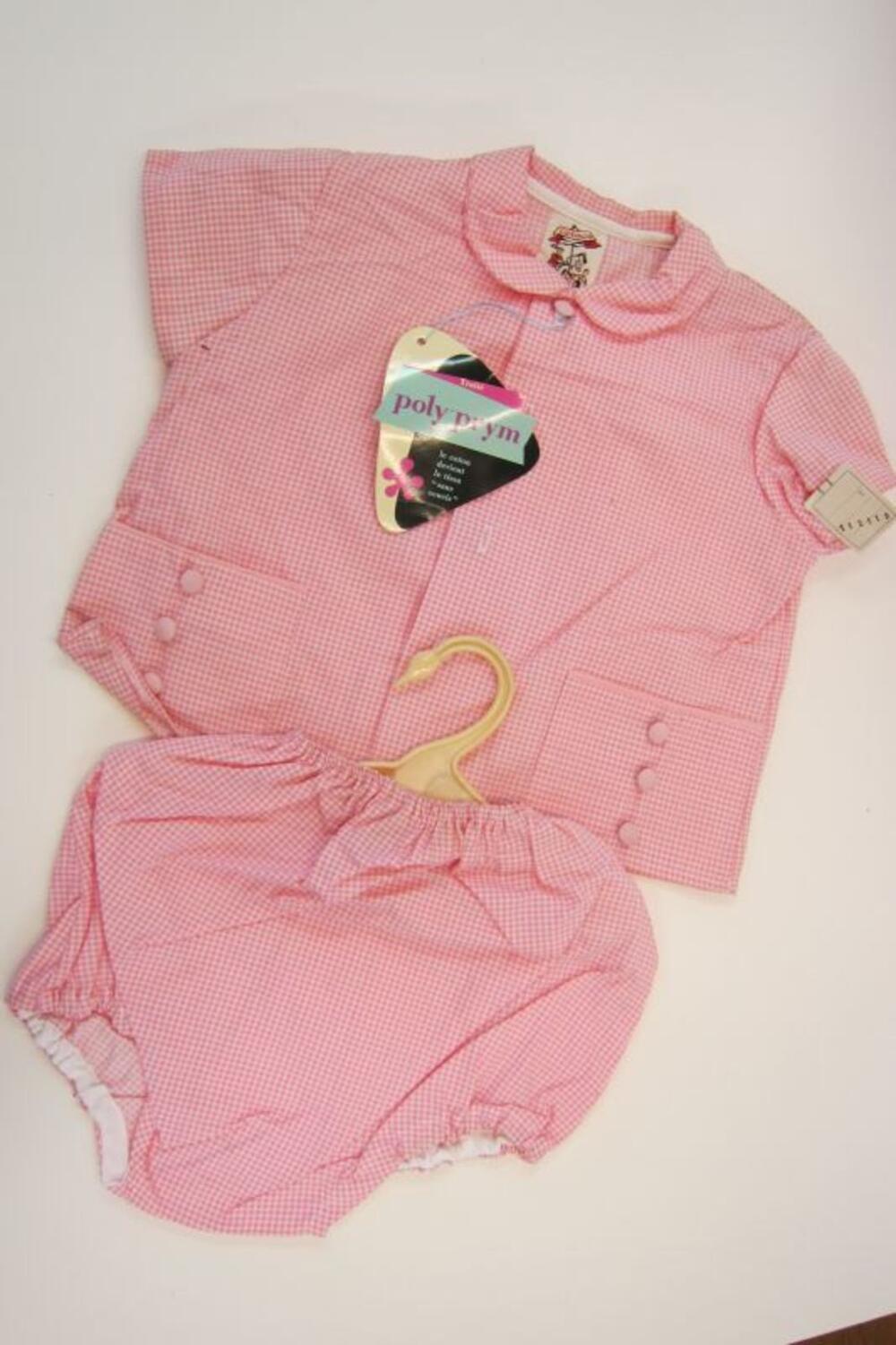 Ensemble in roze bestaande uit blouse en broek