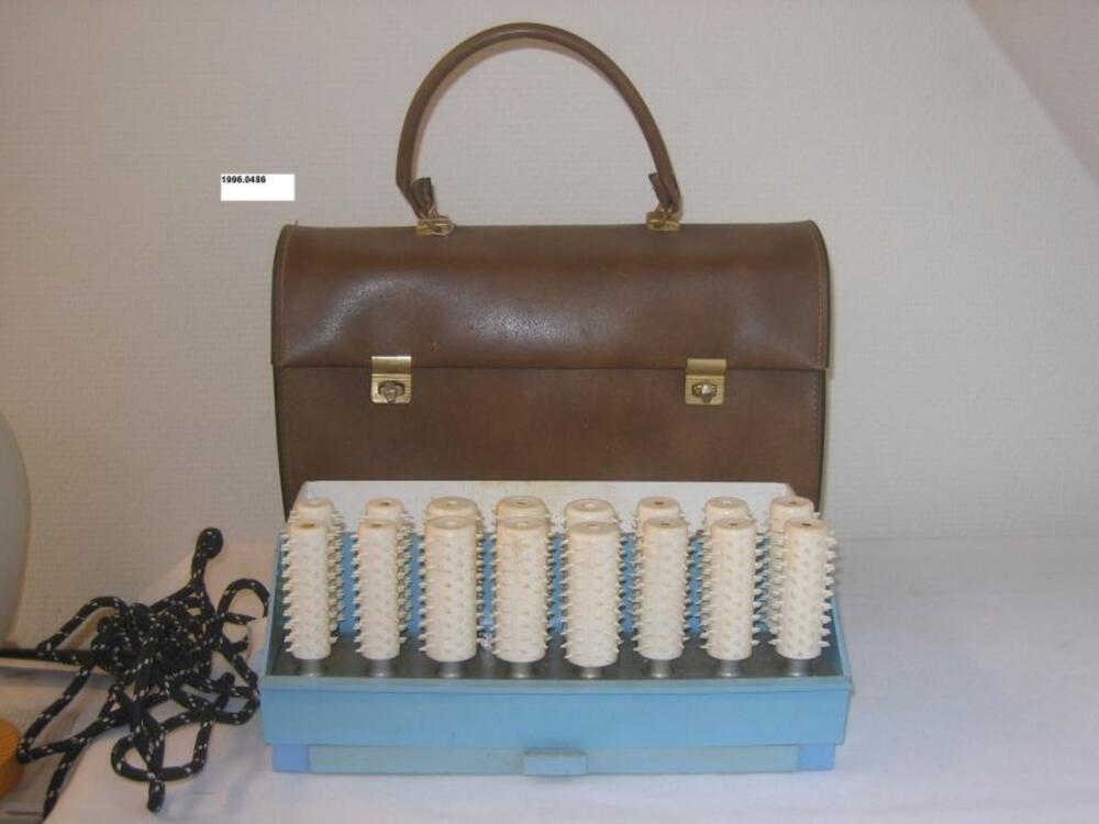 Krulspeldenetui in handtasmodel