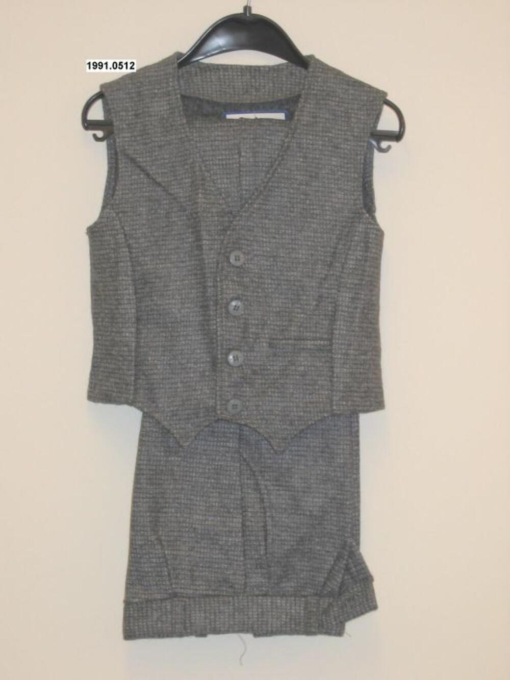 Ensemble bestaande uit broek en gilet in grijze tweed