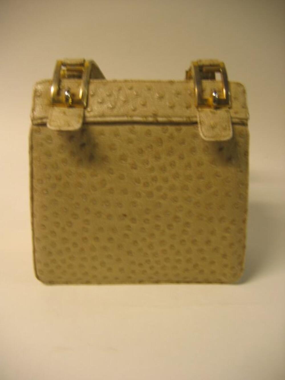 Ensemble bestaande uit handtas en knipbeurs