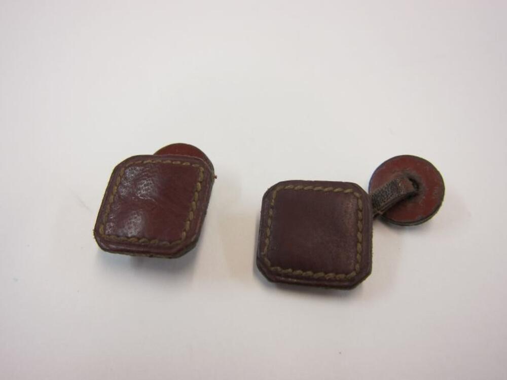 Vierkante, leren damesmanchetknopen met stiksels
