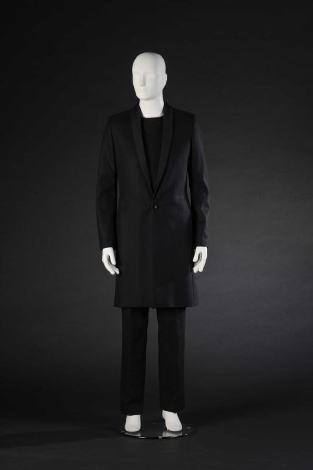 Ensemble bestaande uit mantel, top en lange broek
