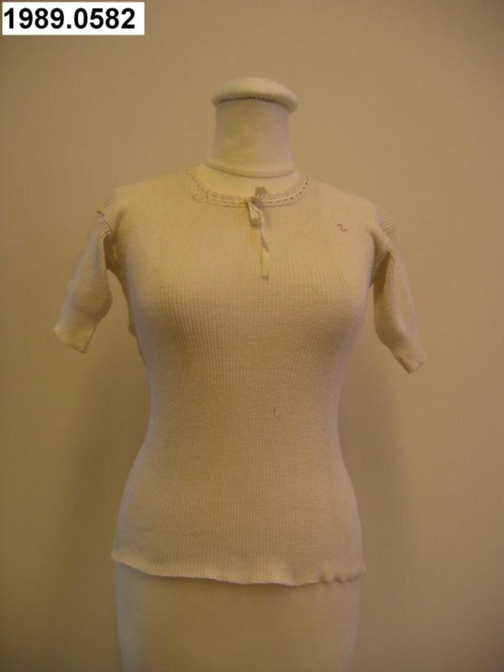 Onderlijfje met korte mouwen in ecrukleurige tricot