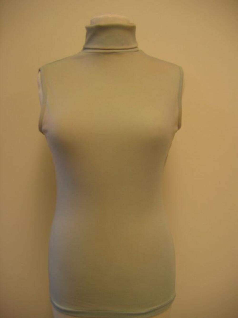 Coltrui in pastelgroene synthetische stof