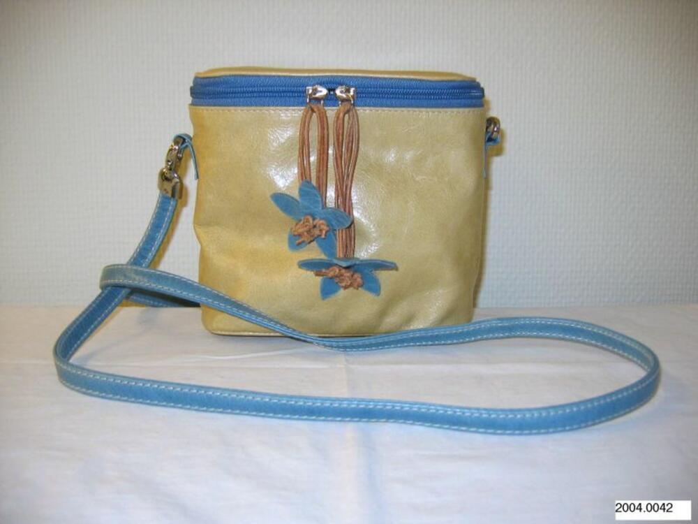 Kleine schoudertas in beige leer met blauwe accenten