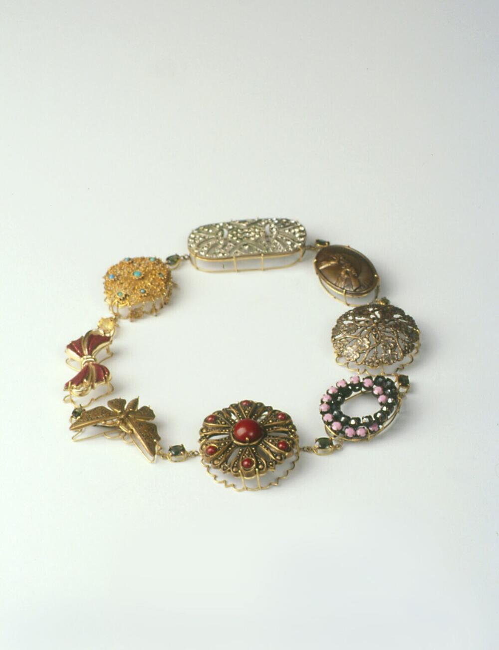 Broche collier