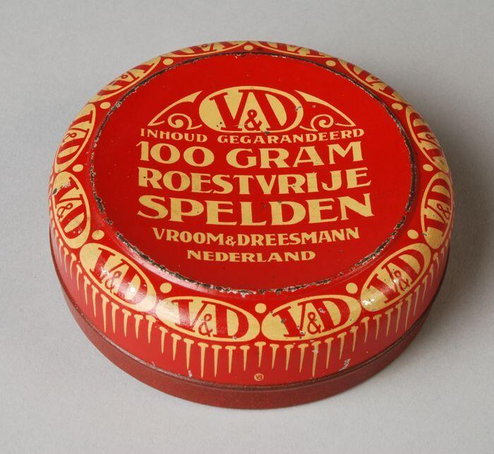 Rond speldenblik, rood-wit, "V&D, roestvrije spelden"