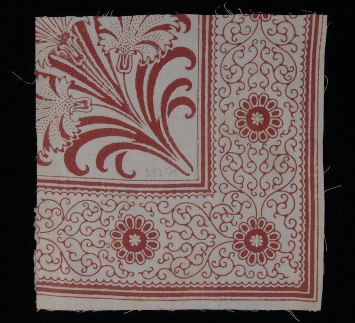 Stofstaal, katoen met dessin van bloemen in rood, Kralingse katoenaatschappij, "2527"