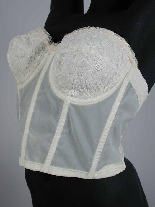 Witte strapless bustier van transparant materiaal met kanten cups met roze bies, zeer lage rug met…