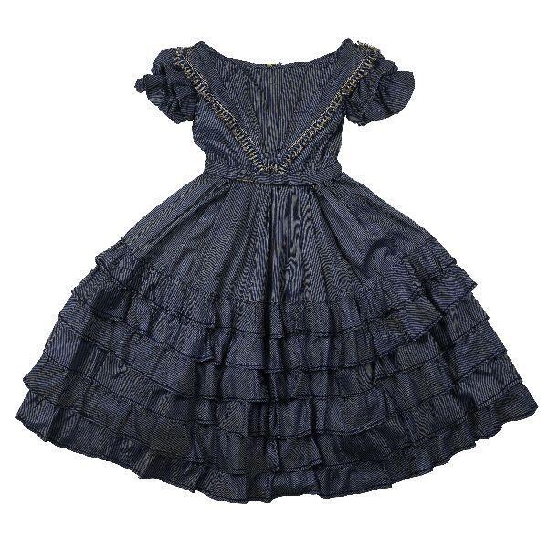 Rok (meisje) van blauw met grijs gestreepte zijde met stroken. Onderdeel van tweedelig jurkje