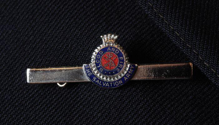 Speld van damesuniform Leger des Heils