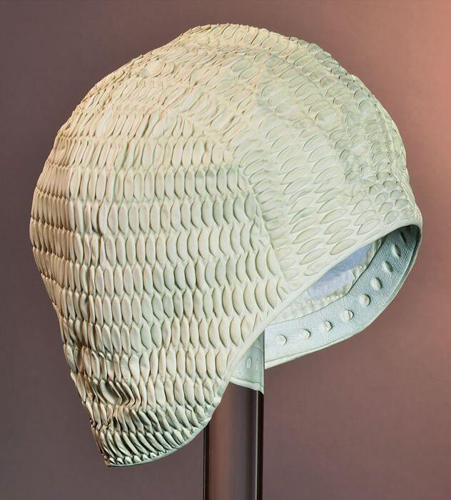 Crèmekleurige rubberbadmuts