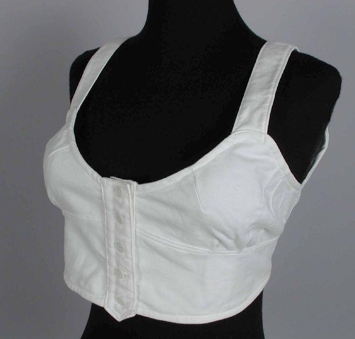 Witte flanellen bustehouder, vrij kleine cups, groot rugpand, knoopsluiting voorzijde brede…