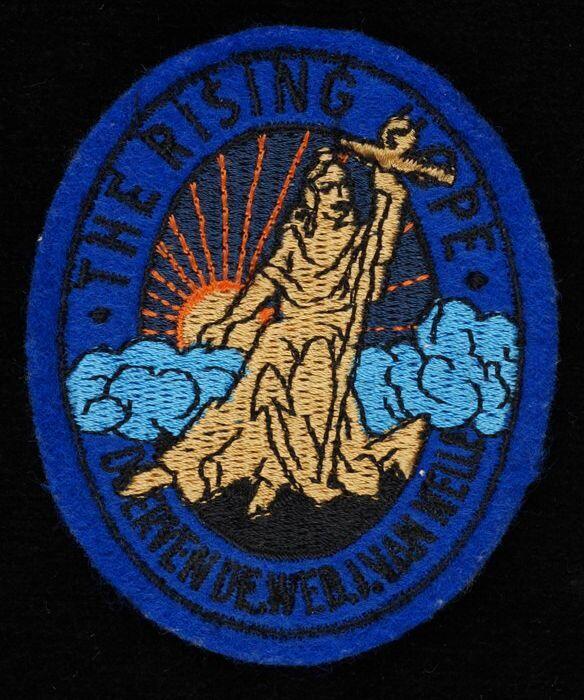 Stoffen embleem van Van Nelle met beeldmerk "the Rising Hope"