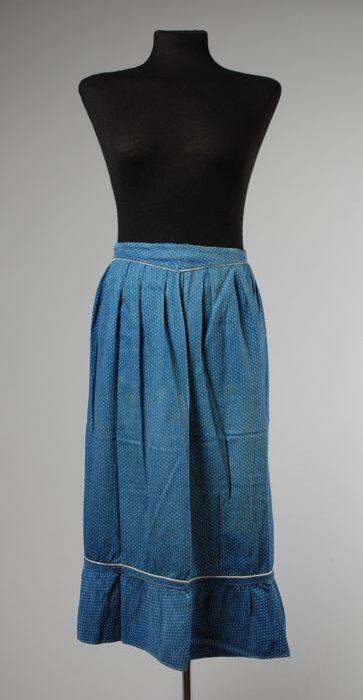 Blauw schort met witte nopjes