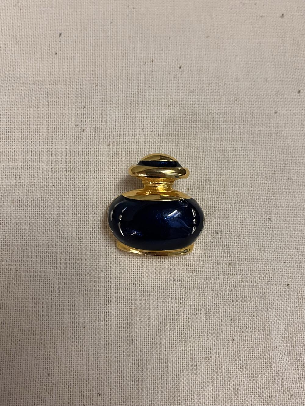 Broche in de vorm van parfumflesje