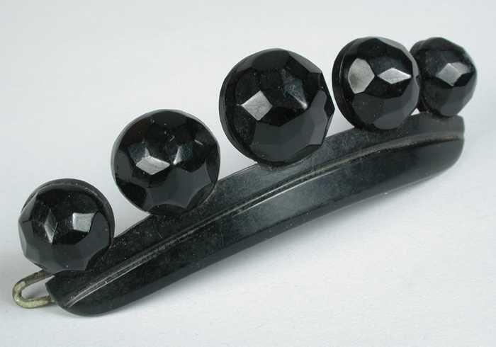 haarschuif, licht gebogen haarspeld van zwart kunststof met vijf halve bollen met facetten, metalen…