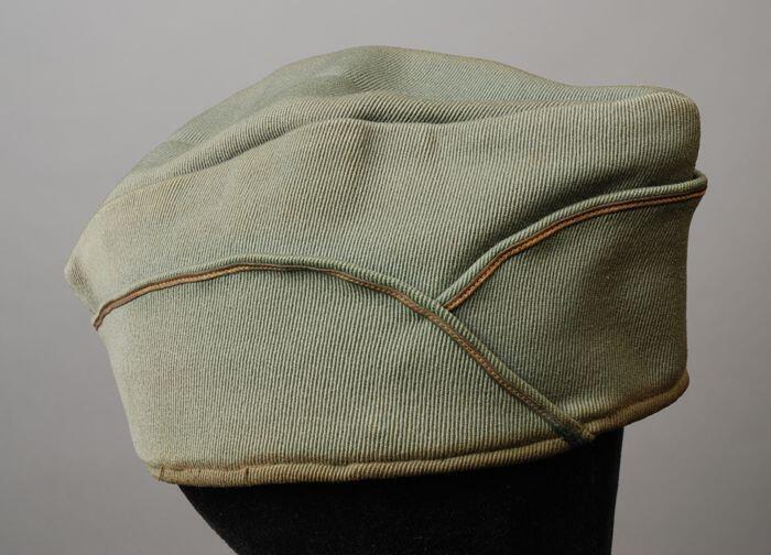 Kwartiermuts van groengrijze keperkatoen uniform burgerwacht, "E. Esders ROTTERDAM"