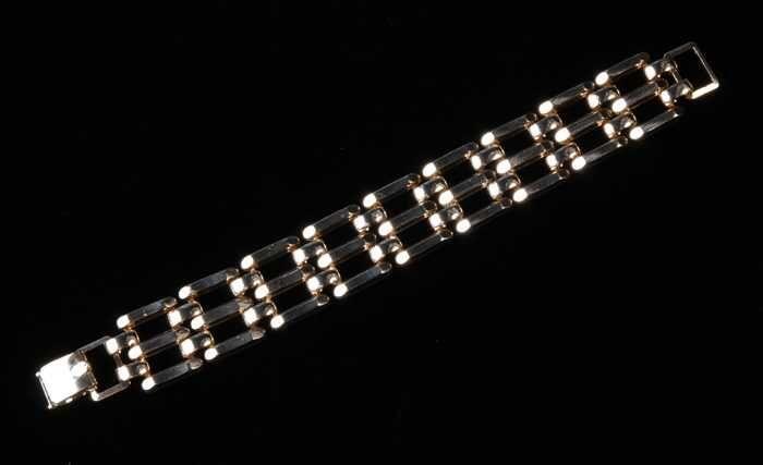 Armband, rechthoekige schakels van goudkleurig metaal, kapper Van Vliet