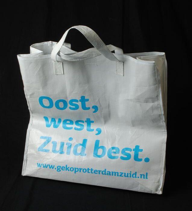 Witte boodschappentas ter promotie van Rotterdam Zuid