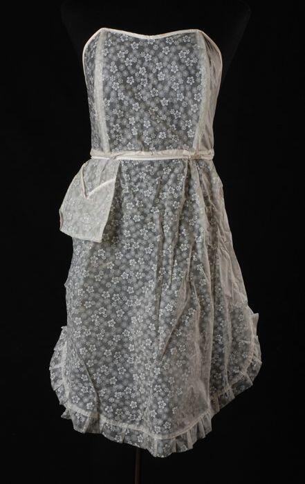Transparant plastic schort met witte bloemen