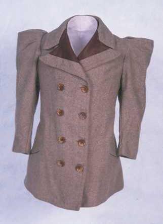 Getailleerde kinderjas van beige wollen tweed