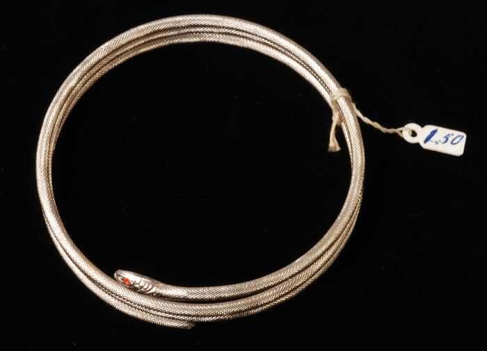 Armband, spiraalarmband in de vorm van een slang, van koperkleurig metaal met drie windingen,…