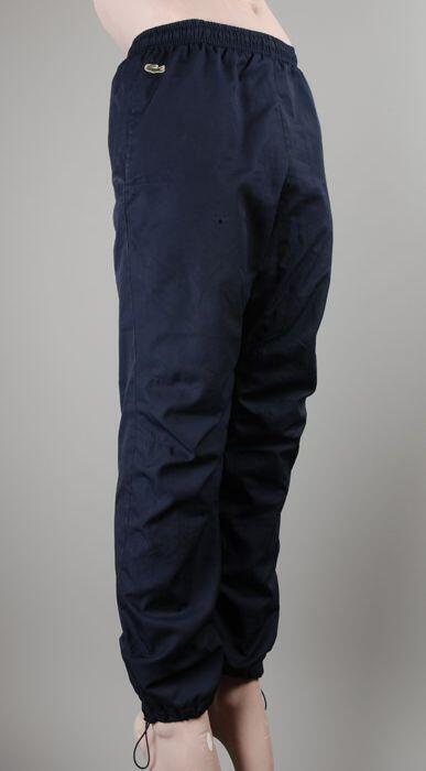 Blauwe trainingsbroek van merk Lacoste