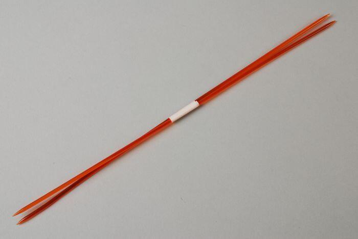 Paar breinaalden zonder knop van transparant oranje kunststof