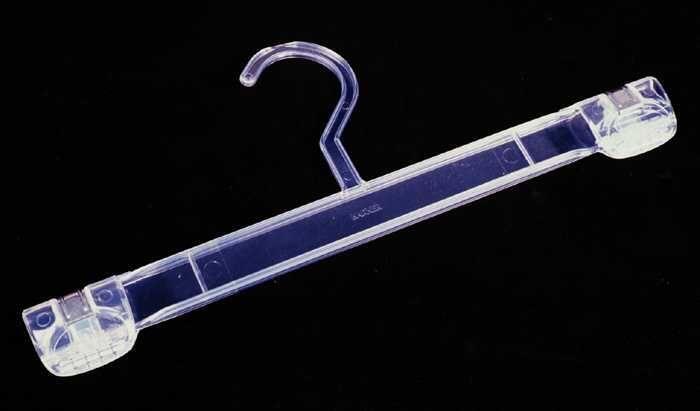 Kleerhanger, vijf stuks, transparant plastic met broeklat